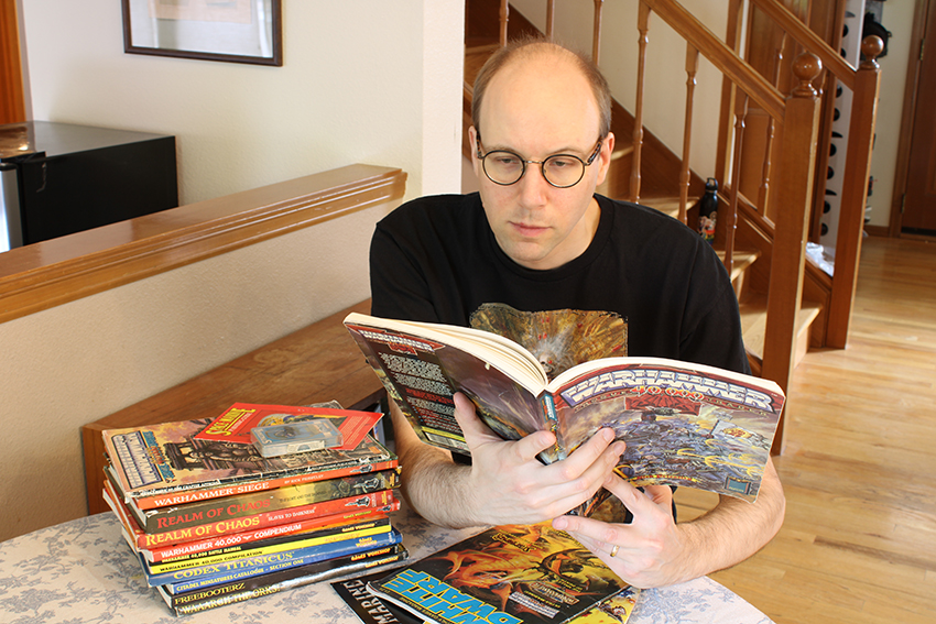 Ethan reading older Warhammer 40,000 books